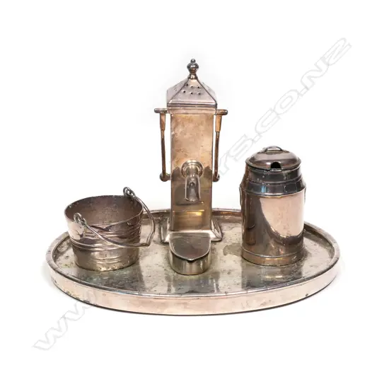 A 19thC Heinrich Kohn marked silver plate novelty cruet set,